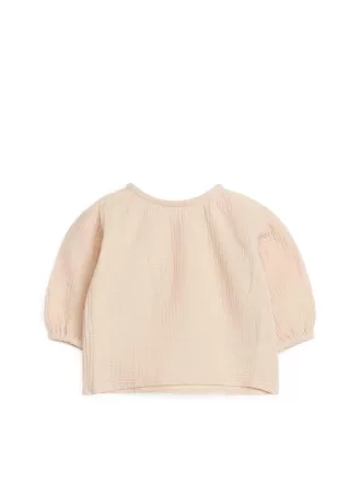 Blusa abullonada de muselina de algodón