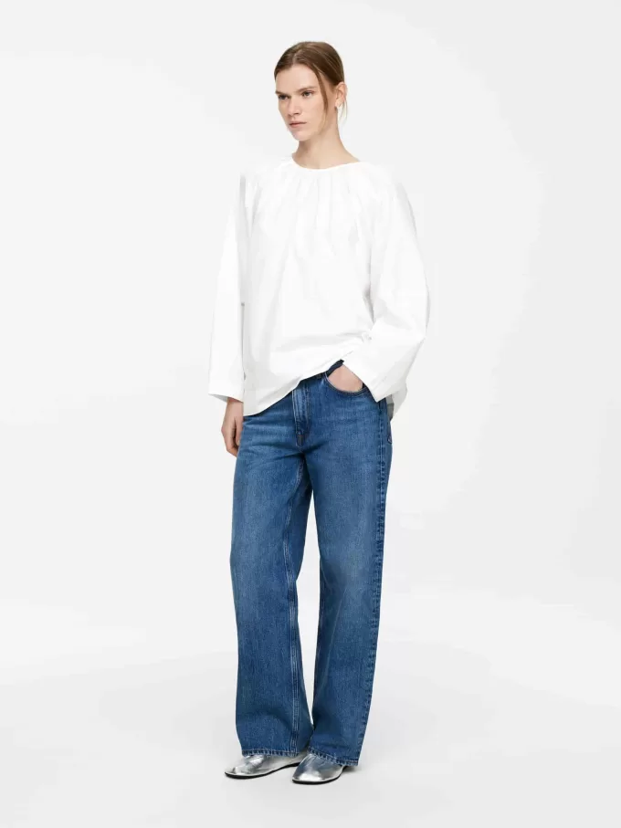 Blusa con espalda redondeada Blusa con espalda redondeada