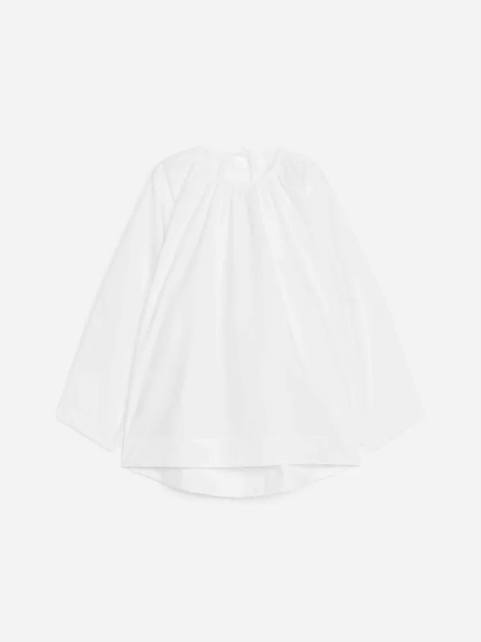 Blusa con espalda redondeada Blusa con espalda redondeada