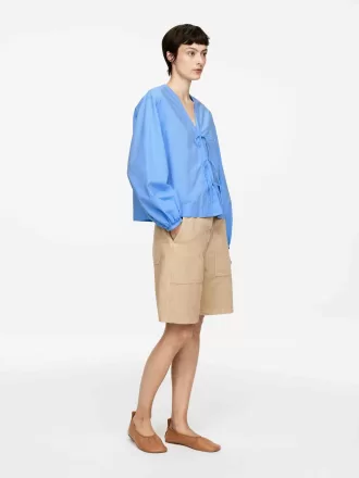 Blusa con lazo delantero