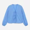 Blusa con lazo delantero Blusa con lazo delantero