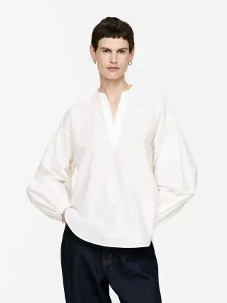 Blusa con mangas voluminosas