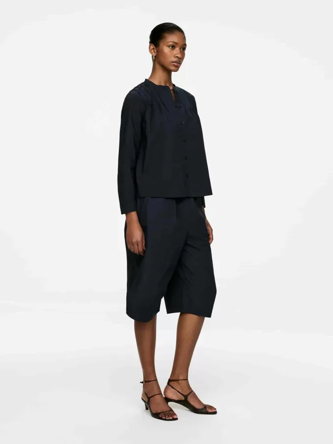 Blusa con pliegues Blusa con pliegues