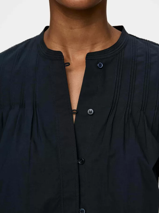 Blusa con pliegues Blusa con pliegues