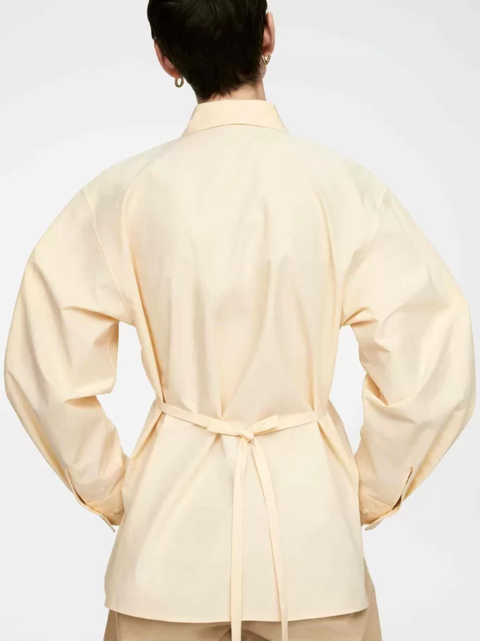 Blusa de algodón con cinturón anudado Blusa de algodón con cinturón anudado