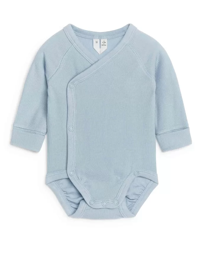 Body recién nacido de canalé liso Body recién nacido de canalé liso