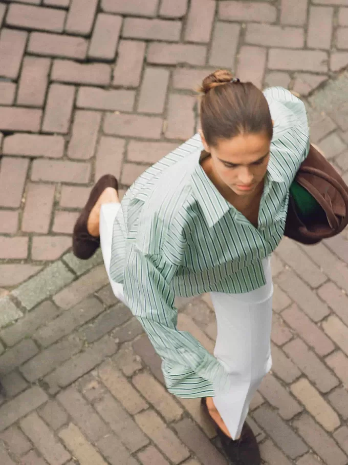 Pantalones de algodón con pliegues a presión Pantalones de algodón con pliegues a presión