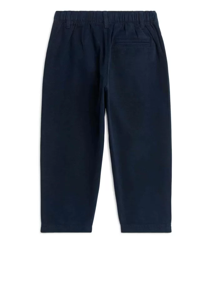 Chinos cónicos de algodón Chinos cónicos de algodón