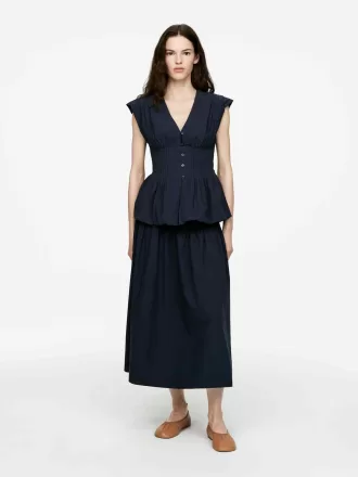 Falda de algodón con pliegues