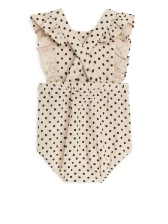 Mameluco de muselina con volantes