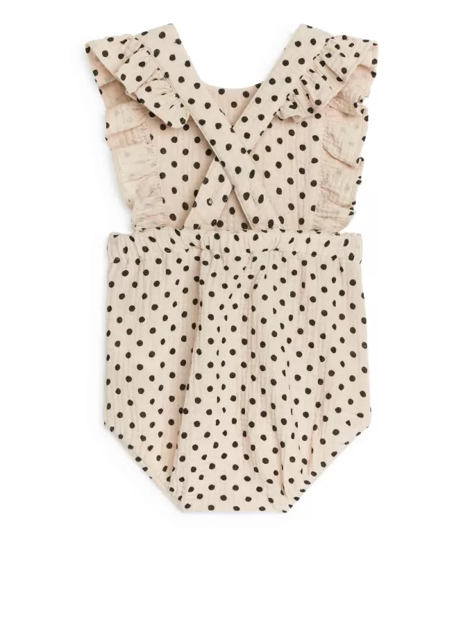 Mameluco de muselina con volantes Mameluco de muselina con volantes