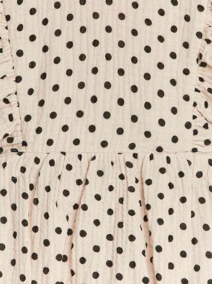 Mameluco de muselina con volantes Mameluco de muselina con volantes