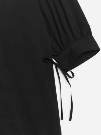 Minivestido con mangas abullonadas