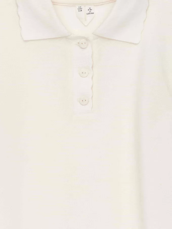 Polo con borde festoneado Polo con borde festoneado