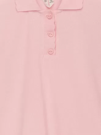 Polo con borde festoneado