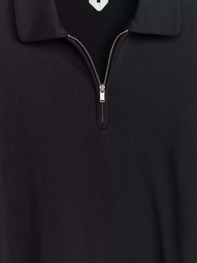 Polo con media cremallera Polo con media cremallera