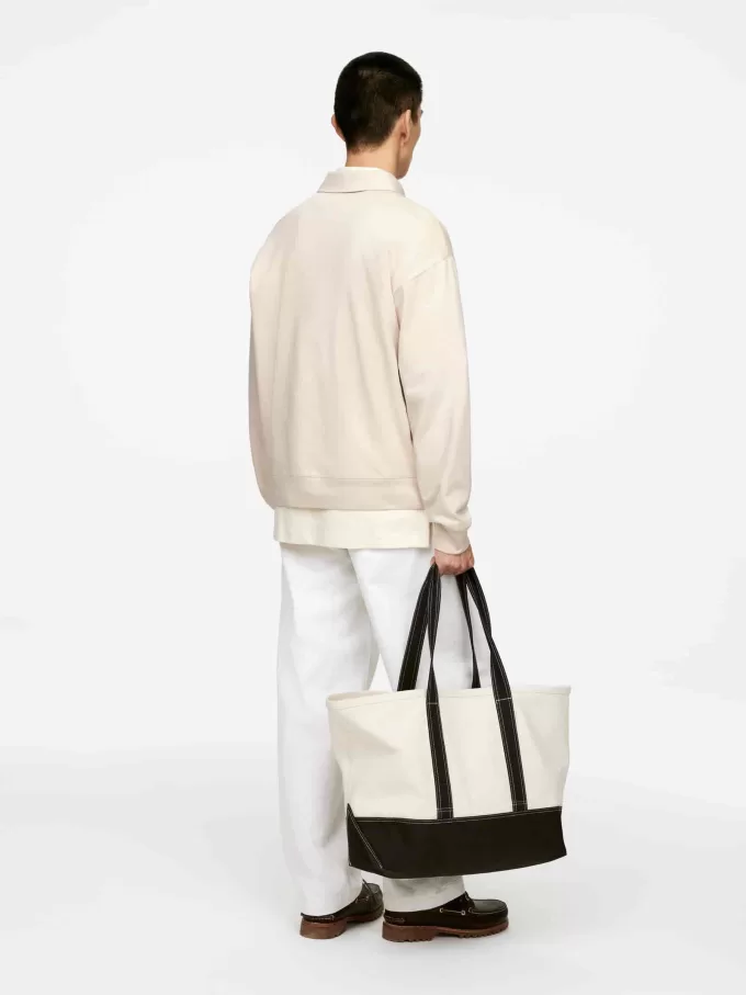 Polo con media cremallera Polo con media cremallera