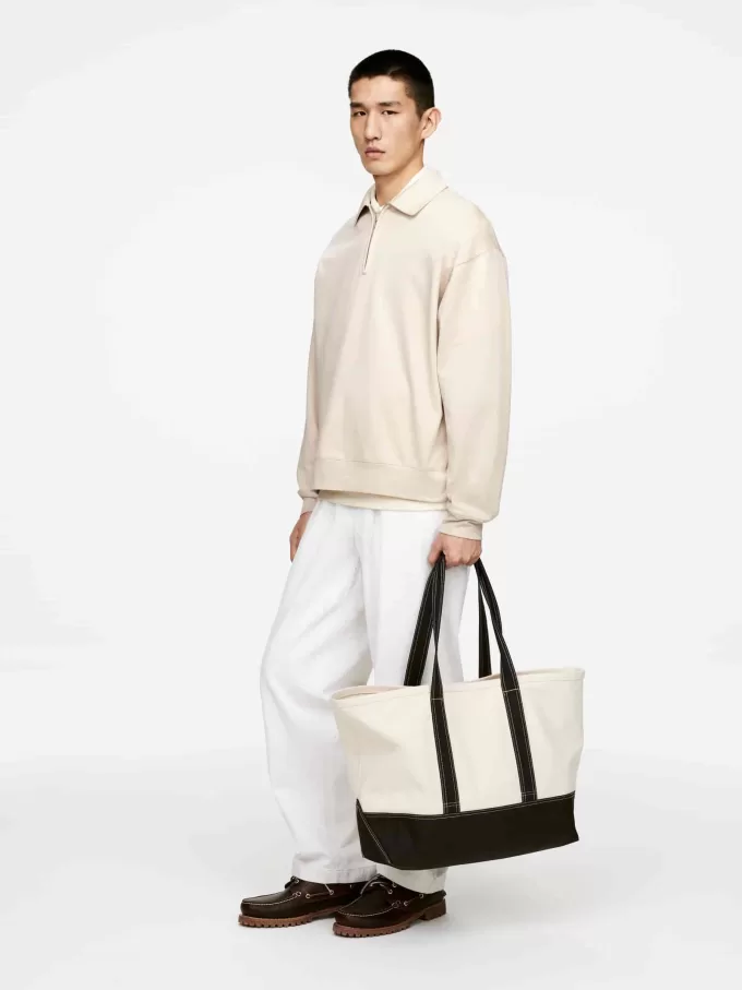 Polo con media cremallera Polo con media cremallera