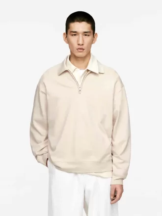 Polo con media cremallera