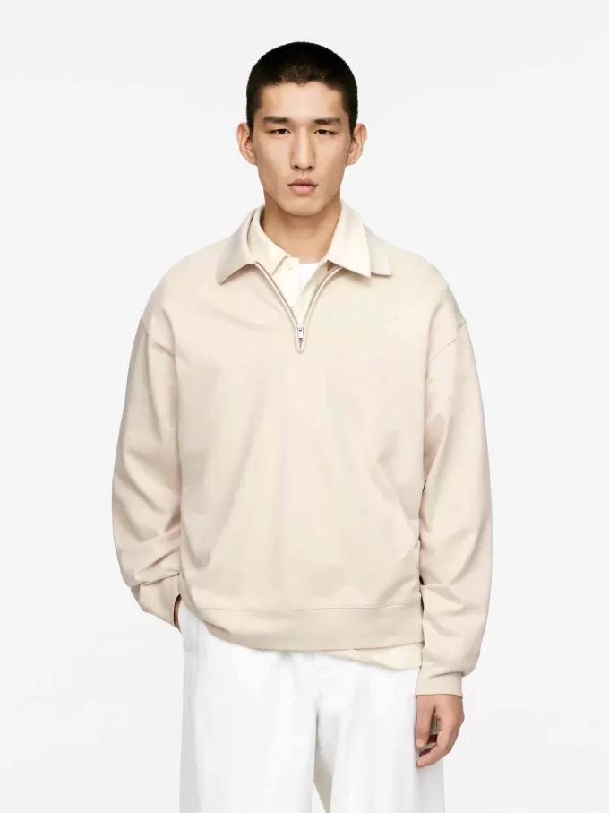 Polo con media cremallera Polo con media cremallera