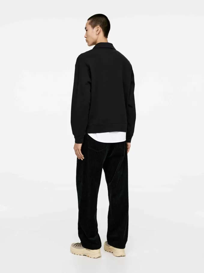 Polo con media cremallera Polo con media cremallera