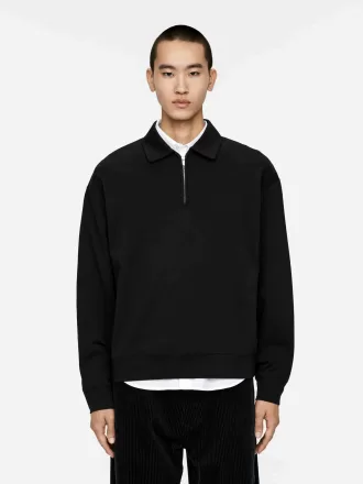 Polo con media cremallera