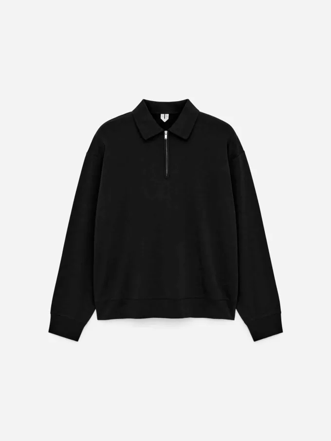 Polo con media cremallera Polo con media cremallera