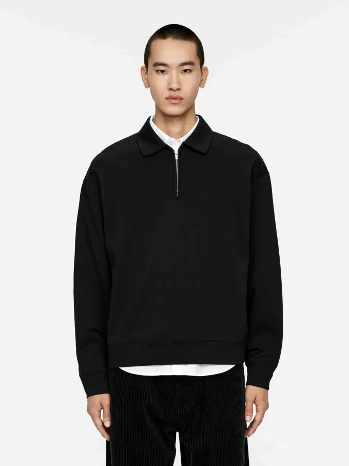 Polo con media cremallera Polo con media cremallera