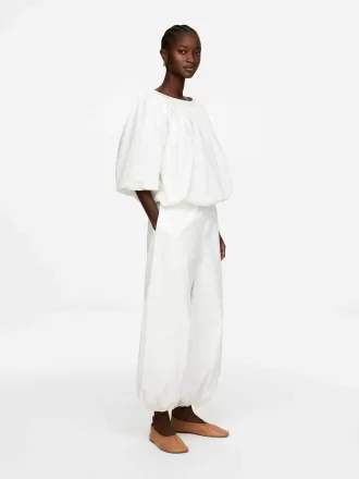 Top con dobladillo abullonado