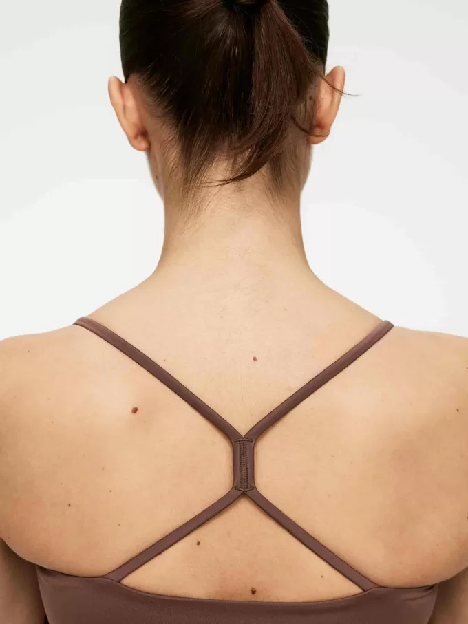 Top elástico suave.