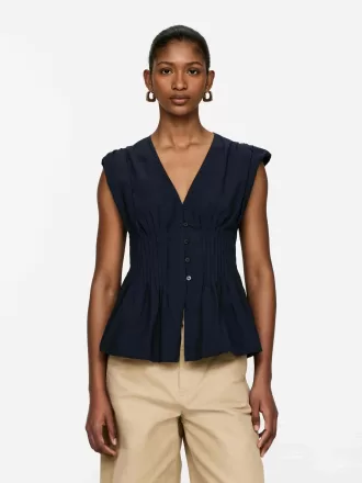 Top pintuck con dobladillo de burbujas