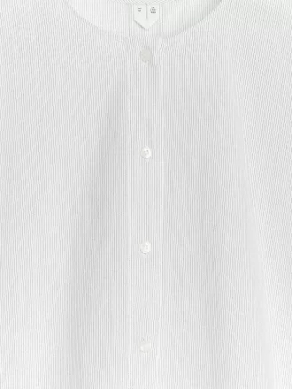 Túnica con mangas casquillo