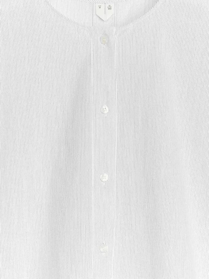 Túnica con mangas casquillo Túnica con mangas casquillo