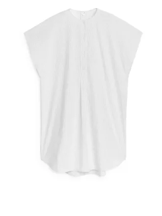 Túnica con mangas casquillo