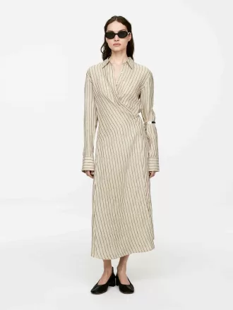 Vestido de lino con detalle cruzado