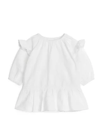 Vestido de sirsaca con volantes