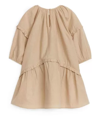 Vestido en mezcla de lino con volantes