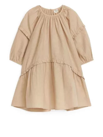 Vestido en mezcla de lino con volantes