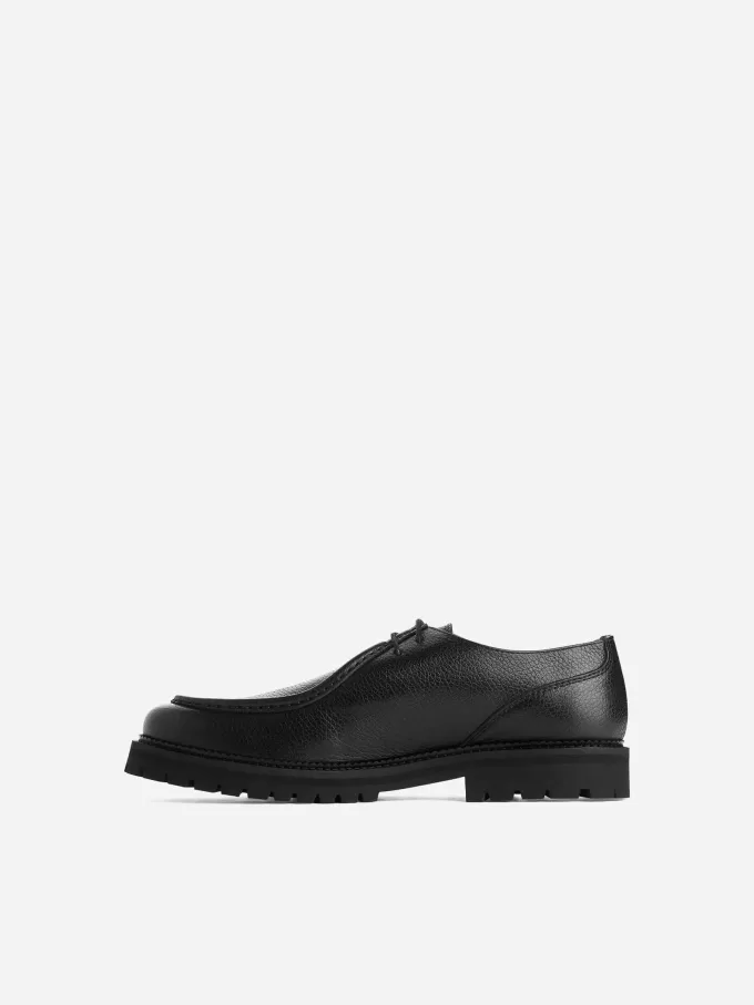 Zapatos de cuero con punta de mocasín Zapatos de cuero con punta de mocasín